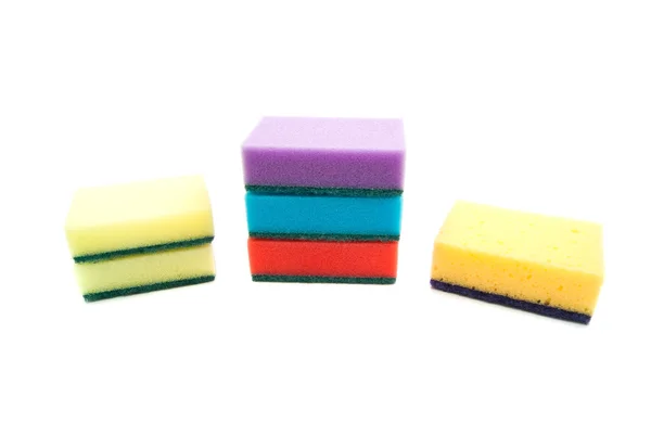 Different colored sponges on white — Stock Photo, Image