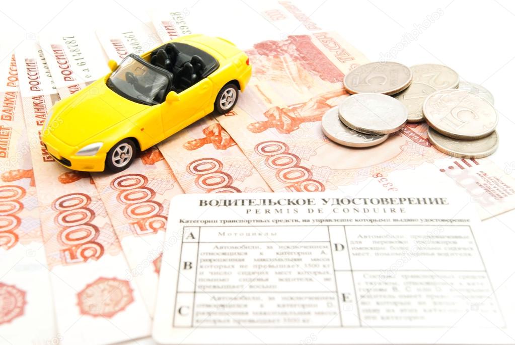 car, driving license and banknotes