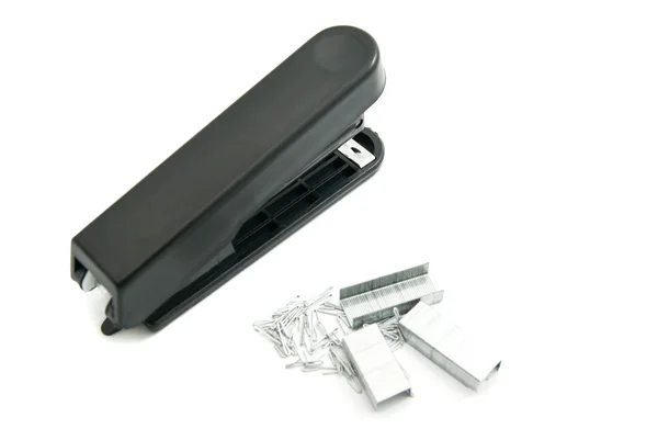 Black stapler and staples — Stock Photo, Image