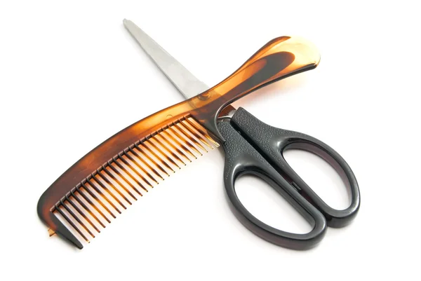 Hairbrush and scissors — Stock Photo, Image