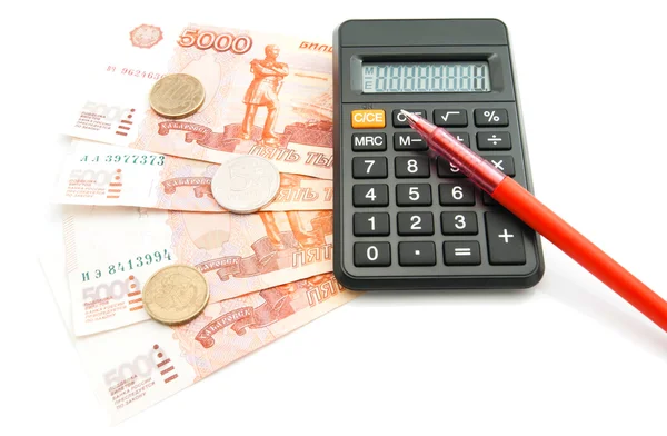 Russian banknotes, red pen, coins and calculator — Stock Photo, Image