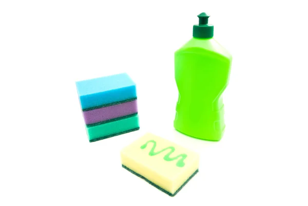 Bottle and four sponges — Stock Photo, Image