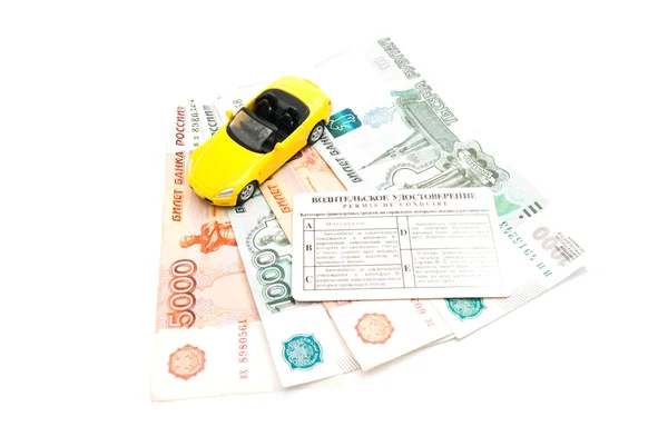 Driving license, money and yellow car — Stock Photo, Image