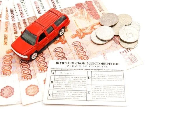 Red car, driving license, coins and banknotes — Stock Photo, Image