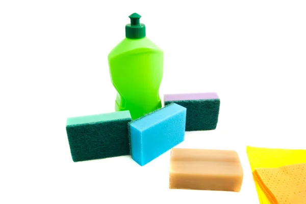 Botella, jabón, trapos y esponjas —  Fotos de Stock