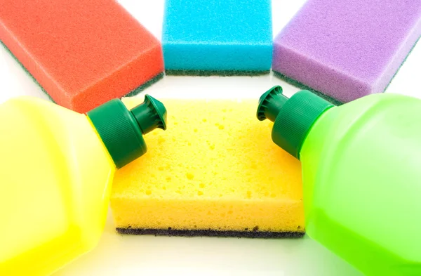 Sponges and two bottles of detergent — Stock Photo, Image