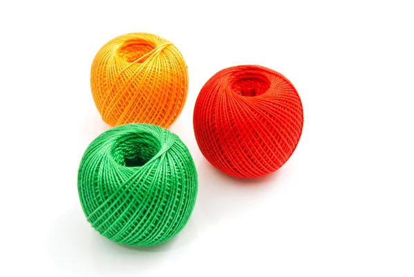 Three colored tangles of thread — Stock Photo, Image