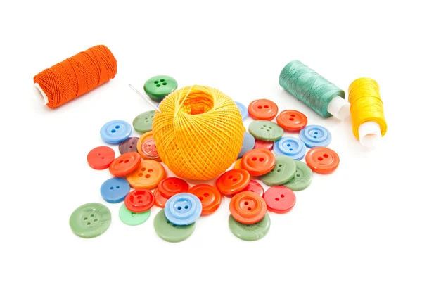 Needle, buttons and thread on white — Stock Photo, Image
