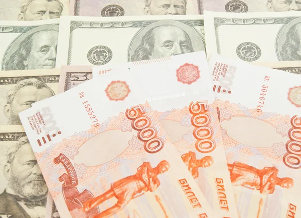 俄罗斯的货币和美元纸币 — 图库照片