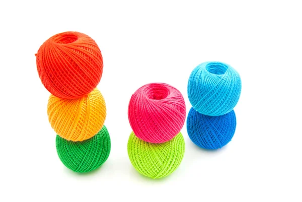 Many colorful balls of yarn on white — Stock Photo, Image