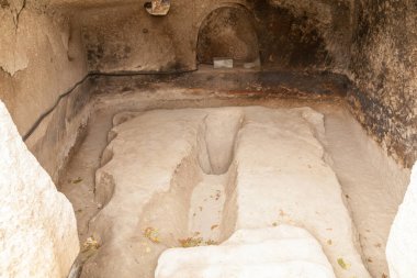 Travel to Georgia - room in an artificial ancient cave city in Vardzia. Most popular Georgian attraction