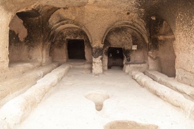Travel to Georgia - room in an artificial ancient cave city in Vardzia. Most popular Georgian attraction