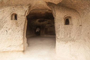 Travel to Georgia - room in an artificial ancient cave city in Vardzia. Most popular Georgian attraction