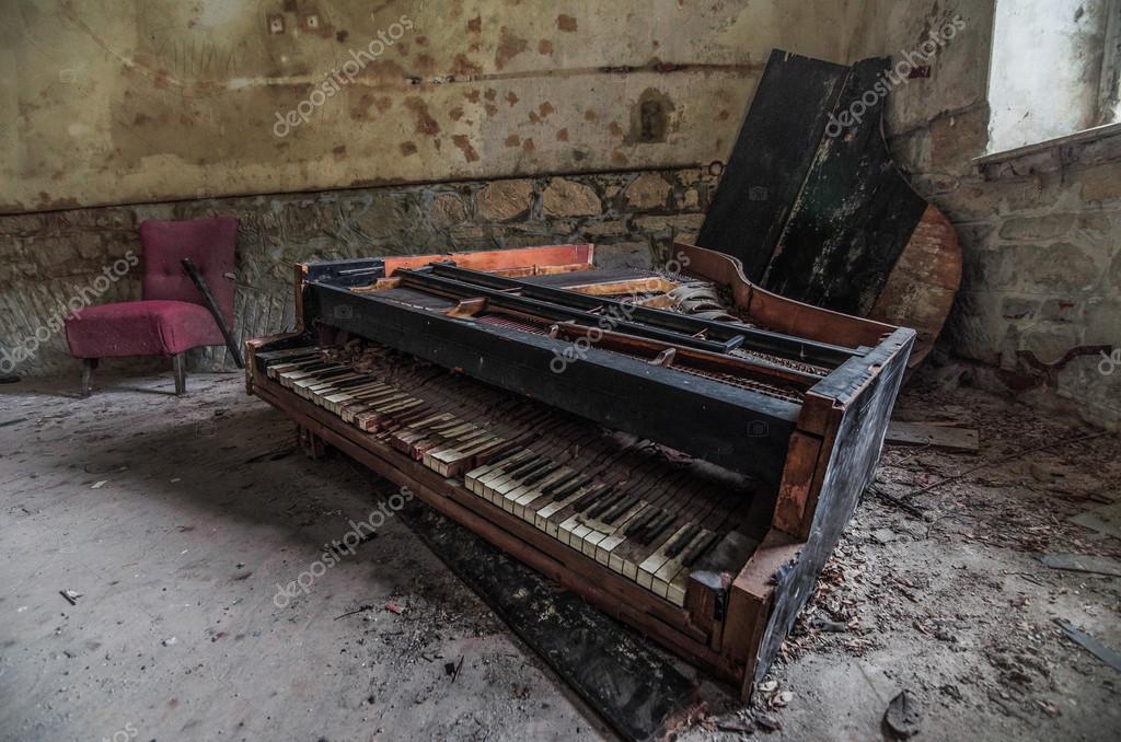 depositphotos_116035080-stock-photo-abandoned-piano-in-house.jpg