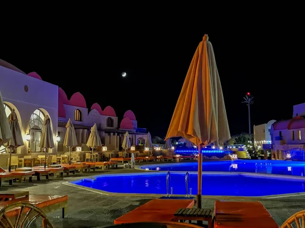 Illuminated Pool Beach Umbrellas Night Moon Sky — Stock Photo, Image