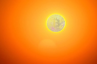 Yanan bitcoin yerine parlak bir güneş turuncu üzerinde biraz sanatsal güneş ışınları ile