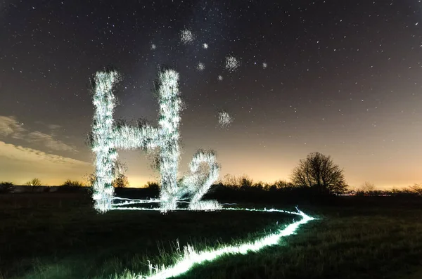 Quema Hidrógeno Caliente Letras Con Rastro Ligero Cielo Estrellado — Foto de Stock