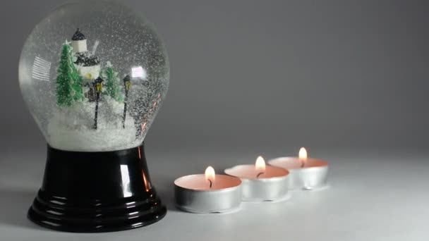 Snow Globe Candles Row Closeup — Stock Video