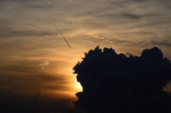 Black cloud at sunset — Stock Photo, Image