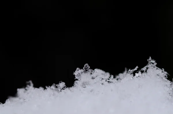 Muchos cristales de nieve fresca —  Fotos de Stock