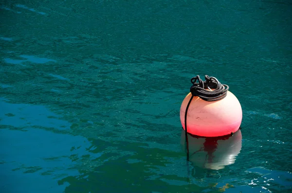 Pink buoy in the sea — Stock Photo, Image