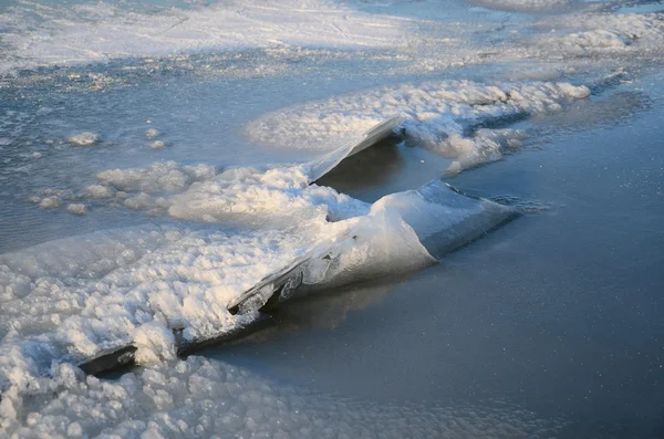 Ice with cracks in the lake detail — Stock Photo, Image