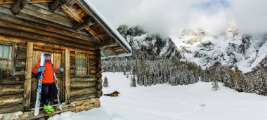 Skiing with amazing panorama of Pale di Sant Martino di Castrozza, Dolomites mountain, Italy clipart