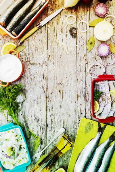 Herring - salad with cream, onion, dill-preparation background — Stock Photo, Image