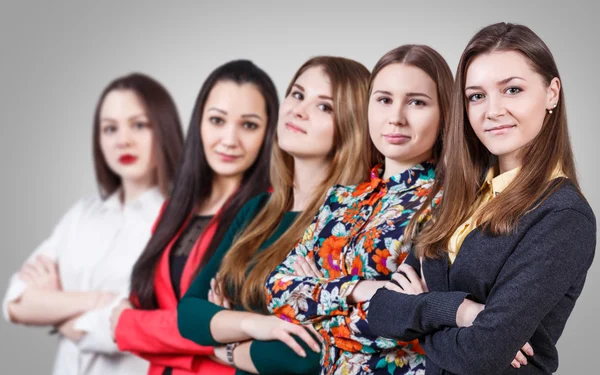 Schöne Frauen mit gekreuzten Händen — Stockfoto