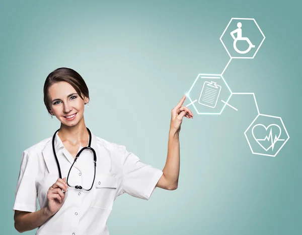 Médico femenino en hexágono táctil uniforme con iconos —  Fotos de Stock