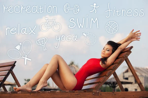 Young woman in red swimsuit — Stock Photo, Image