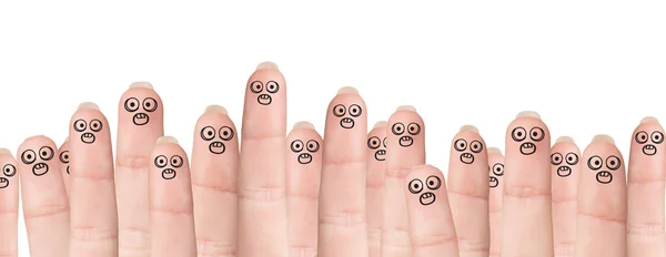 Veel vingers met getekende gezichten — Stockfoto