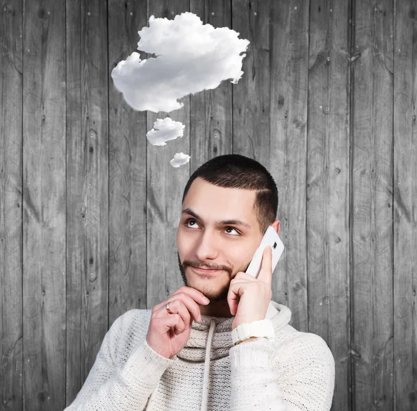 Young man daydream and speak on the phone — Stock Photo, Image