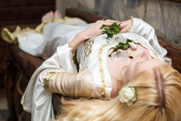 Sleeping beauty lying on the table — Stock Photo, Image