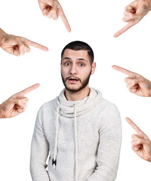 Viele Hände zeigen auf überraschten Mann — Stockfoto