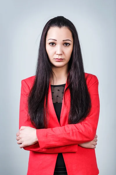 Young woman with crossed hands — Stock Photo, Image