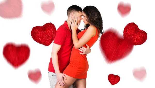 Young couple hugging and heart falling — Stock Photo, Image