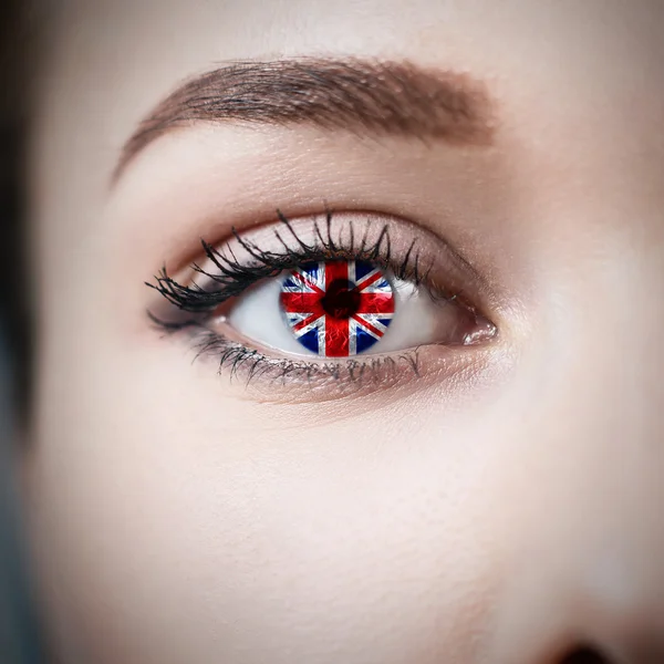 Ojo femenino de cerca con bandera del país — Foto de Stock