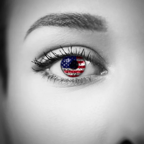 Close-up female eye with country flag — Stock Photo, Image