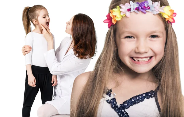 Doctor examining throat of little girl — Stock Photo, Image