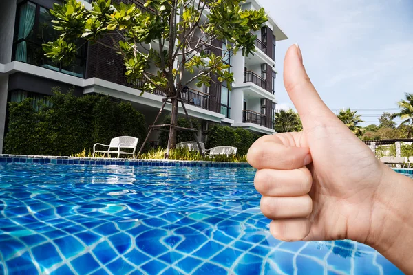 Female hand showing thumb up sign — Stock Photo, Image