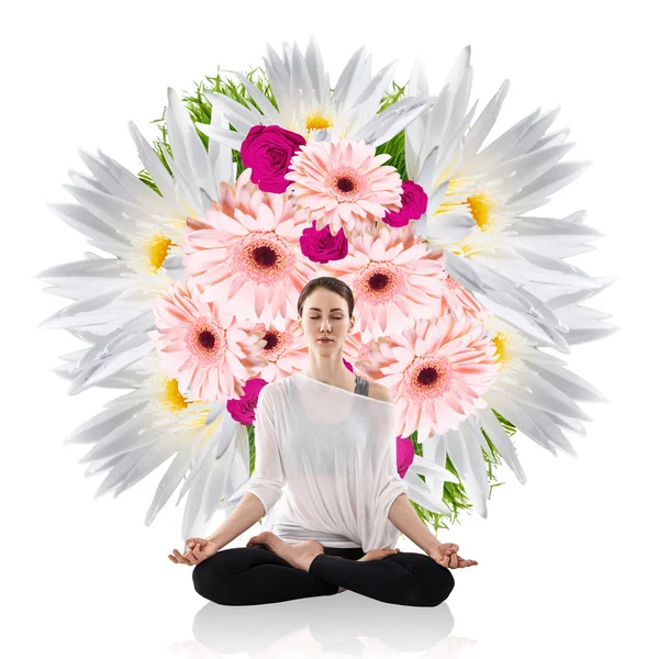 Woman practicing yoga in the lotus position — Stock Photo, Image