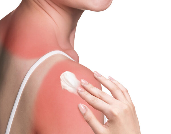 Sunblock on the shoulder of a young woman