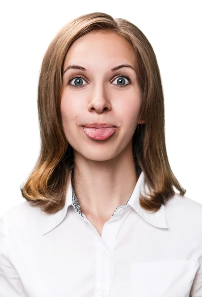 Giovane donna mostrando smorfia con la lingua — Foto Stock