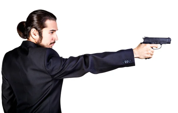 Gangster man in zwart pak gericht pistool — Stockfoto