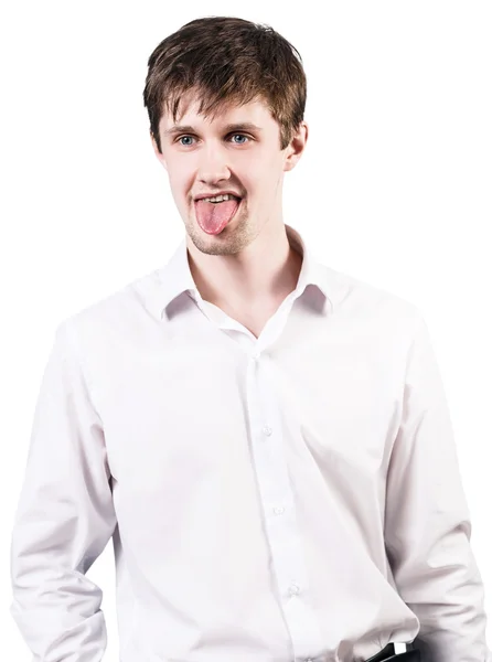 Young handsome man showing tongue — Stok fotoğraf