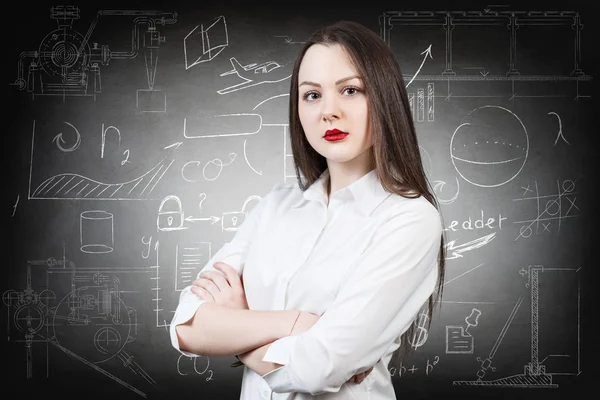 Mujer sobre la escuela pizarra fondo —  Fotos de Stock