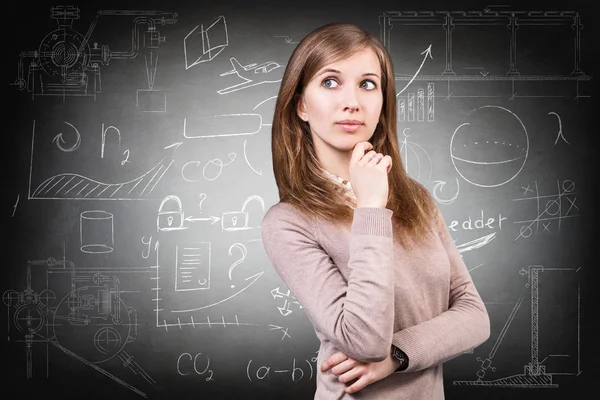 Woman over school chalk board background Stock Image