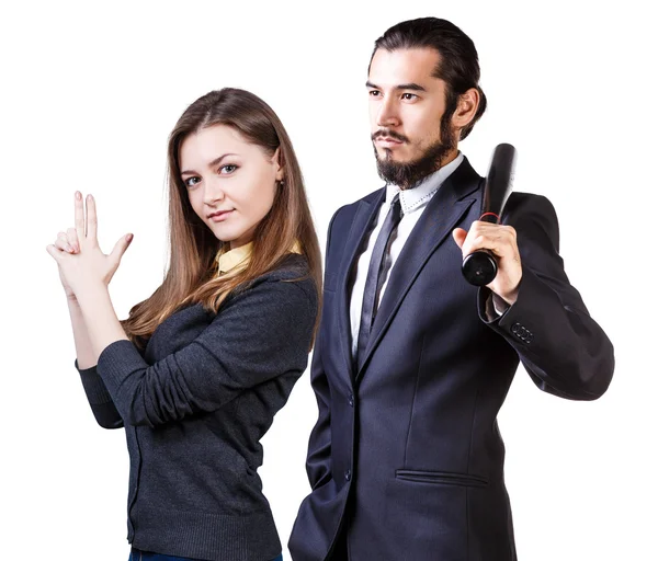 Woman gesturing gun man with bat — Stock Photo, Image