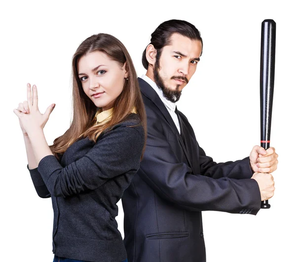 Woman gesturing gun man with bat — Stock Photo, Image